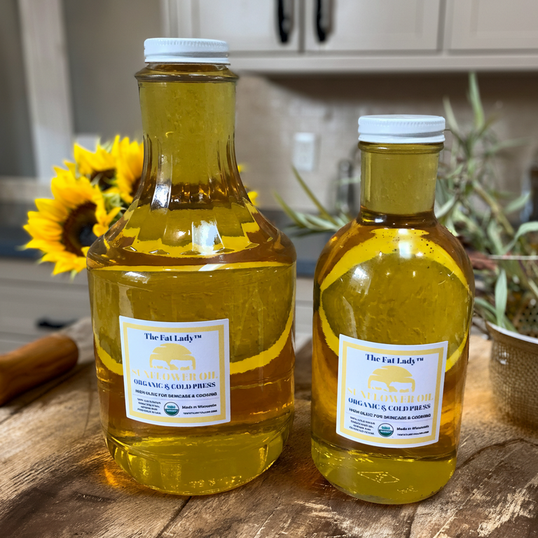 Organic cold press sunflower oil by The Fat Lady, Wisconsin Provisions, shown in a bottle ideal for skincare and cooking use.
