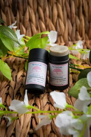 Photo with 2 products and roses in the background - Tallow Natural Deodorant with French Clay and Rosemary
