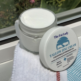 Frasco abierto de crema 