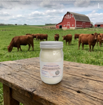 Premium grass-fed beef tallow in a pint glass jar from The Fat Lady, dry rendered suet ideal for cooking and skincare applications.