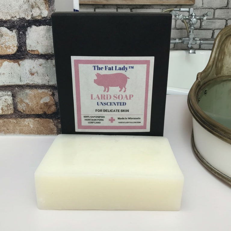 Unscented leaf lard soap bar by The Fat Lady, tallow facial skincare for delicate skin, showing a plain, natural soap bar.